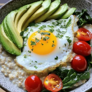 - 1 cup rolled oats - 2 cups vegetable broth (or water) - 1 medium ripe avocado, sliced - 1 large egg - 1/2 cup cherry tomatoes, halved - 1 cup baby spinach - 1 tablespoon olive oil - 1 tablespoon soy sauce (or tamari for gluten-free option) - 1/2 teaspoon garlic powder - 1/4 teaspoon black pepper - Salt to taste - Fresh herbs (such as cilantro or parsley) for garnish The ingredients for savory oatmeal with egg offer great flavor and nutrition. Oats are the base and are rich in fiber. They help you feel full longer. The vegetable broth adds depth and a savory taste. You can use water if you prefer. Avocado brings creaminess and healthy fats. Cherry tomatoes add sweetness and a pop of color. Baby spinach gives you vitamins and minerals. Olive oil adds healthy fat and flavor. Soy sauce or tamari brings umami. Garlic powder and black pepper add kick. Fresh herbs brighten the dish and make it beautiful. Oats are a superfood packed with nutrients. They provide fiber, which is great for digestion. They also contain protein and healthy carbs. The egg brings protein and essential vitamins to the table. Eggs are great for muscle health and energy. Adding vegetables like spinach and tomatoes boosts the dish's nutrition. They add vitamins A, C, and K. This dish is not just tasty; it also helps you stay healthy. Eating a balanced breakfast fuels your body and mind for the day ahead. Start by boiling the vegetable broth or water in a medium saucepan. This is the base for your savory oatmeal. Bring it to a rolling boil. Then, stir in the rolled oats and reduce the heat to a simmer. Let them cook for about 5 minutes. Stir occasionally to keep the oats creamy and prevent sticking. When done, the oats should be thick and smooth. While the oats cook, heat olive oil in a small skillet over medium heat. Crack the egg into the skillet to cook it. You can choose to make it sunny side up or over easy. For sunny side up, let the egg sit until the white is set but the yolk remains runny. If you prefer it over easy, gently flip the egg and cook for about 30 seconds more. Season with a pinch of salt and black pepper for extra flavor. After your oats are ready, stir in the garlic powder and soy sauce. This adds depth to the dish. Taste and adjust the seasoning, adding more salt or pepper if needed. In the same skillet with the egg, toss in the baby spinach and halved cherry tomatoes. Stir for 1-2 minutes until the spinach is wilted. Now, it’s time to combine everything. Transfer the oats to a bowl, add the sautéed spinach and tomatoes on top, and place the cooked egg right in the center. Finish with sliced avocado and fresh herbs for a vibrant touch. Enjoy your savory oatmeal with egg! For the complete recipe, check out the Full Recipe. To get the perfect oatmeal, start with the right ratio of liquid to oats. I use two cups of vegetable broth for one cup of rolled oats. This mix makes the oats creamy and full of flavor. Stir the oats often while they cook to avoid clumping. Common mistakes include not adding enough liquid or cooking the oats too long. If you see dried, hard bits, you may need more broth. Always check for creaminess and adjust as needed. You can cook eggs in many ways. A sunny-side-up egg gives a nice runny yolk, while an over-easy egg has a firmer yolk but still stays moist. For a different texture, try poaching the egg. Poached eggs sit nicely on top and look fancy too. If you want a quick option, scrambled eggs mix well into the oatmeal. They add protein and flavor, making your dish more filling. To boost flavor, consider adding spices. A pinch of paprika or chili flakes gives a warm kick. You can also try mixing in cheese, like feta or cheddar. Cheese melts nicely over warm oats and adds creaminess. Other toppings like nuts or seeds add crunch and nutrition. Fresh herbs make your dish pop with color and taste. Mix and match to find your favorite flavor combinations! For the full recipe, check out the details above. {{image_2}} You can easily add more veggies to your savory oatmeal. Try these: - Mushrooms: Sautéed mushrooms add a rich, earthy taste. - Zucchini: Grate zucchini and mix it in for a fresh crunch. - Bell Peppers: Diced bell peppers bring color and a sweet flavor. Feel free to explore other cuisines! For a Mexican twist, add diced jalapeños and cilantro. For an Italian flair, try sun-dried tomatoes and basil. If you want to switch up the egg, here are some great options: - Tofu: Silken tofu works well for a creamy texture. Cook it with spices for flavor. - Chickpeas: Roasted chickpeas add a nice crunch and protein boost. You can also add other protein sources, like shredded chicken or cooked lentils. They blend well with the oats. For those with gluten sensitivity, gluten-free oats are a must. Here are some ideas: - Quinoa: Swap oats for quinoa for a nutty flavor and extra protein. - Buckwheat: This grain is gluten-free and adds a unique taste. Be sure to check all your ingredients. Use gluten-free soy sauce or tamari to keep your dish safe and tasty. Mix and match these variations to create your perfect bowl of savory oatmeal! For the complete recipe, check out the Full Recipe. To store savory oatmeal, let it cool first. Place it in an airtight container. Store it in the fridge for up to three days. When reheating, use the microwave or stovetop. Add a splash of water or broth to keep it creamy. Stir well while heating to ensure even warmth. Yes, you can freeze savory oatmeal. Place it in a freezer-safe container. Leave some space for expansion. To thaw, move it to the fridge overnight. Reheat it on the stovetop or microwave, adding water as needed. In the fridge, savory oatmeal lasts about three days. If it smells sour or has a strange color, it has spoiled. Always check for any mold before eating. Trust your senses; if it seems off, throw it out. Savory oatmeal is a warm bowl of oats with a twist. Unlike sweet oatmeal, it uses broth for cooking. This adds a rich, hearty flavor. You can mix in vegetables, spices, and proteins. The taste is creamy and satisfying, with a hint of umami. It’s a great way to start your day with a healthy meal. Yes, you can make savory oatmeal ahead of time! Cook the oats and let them cool. Store them in an airtight container in the fridge for up to three days. When you’re ready to eat, just reheat and add your toppings. You can also prepare the sautéed vegetables in advance. This makes your morning easier and quicker. There are many tasty toppings for savory oatmeal. Here are some ideas: - Sautéed mushrooms - Crumbled feta cheese - Chopped green onions - Roasted bell peppers - A dollop of hummus - Sliced radishes - A sprinkle of sesame seeds Feel free to mix and match. You can create your perfect bowl. The Full Recipe gives a great base, but toppings can make it your own! This blog post explored how to make savory oatmeal that is nutritious and tasty. We covered ingredients and their health benefits, like oats, eggs, and veggies. I shared step-by-step cooking methods to get the texture just right. You learned about tips for perfecting the dish and variations to suit your taste. Lastly, I explained storage practices for leftovers and answered common questions. Enjoy creating your own savory oatmeal, and don’t hesitate to experiment with flavors and ingredients. Your kitchen adventures await!