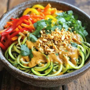 - 2 large zucchinis, spiralized - 1 cup bean sprouts - 1 bell pepper, thinly sliced (preferably a mix of red and yellow) - 1 carrot, julienned - 3 green onions, chopped (white and green parts separated) Zucchini is the star of this dish. It makes a great noodle substitute. Spiralizing the zucchinis gives them a fun shape. The texture stays crunchy, which I love. Bean sprouts add a nice bite. They also bring freshness. Bell peppers and carrots offer vibrant colors and sweetness. Together, they make the dish lively and bright. - 2 tablespoons peanut butter (smooth) - 3 tablespoons low-sodium soy sauce - 1 tablespoon fish sauce (or use coconut aminos for a vegan option) - 1 lime, juiced - 2 cloves garlic, minced - 1 tablespoon fresh ginger, minced - 1 tablespoon sesame oil The sauce is where the magic happens. Peanut butter gives it creaminess. Soy sauce adds salt and umami. Lime juice brings a zesty kick. Garlic and ginger add warmth and depth. This simple blend creates a tasty sauce that hugs the noodles. - 1/2 cup unsalted peanuts, crushed - Fresh cilantro for garnish (optional) - Red pepper flakes (to taste; optional) Garnishes make your dish look pretty. Crushed peanuts give a nice crunch. Fresh cilantro adds a pop of color and flavor. Red pepper flakes can add heat if you like. These toppings make your Zucchini Noodle Pad Thai even better. For the full recipe, check the details above. Spiralizing Techniques To make zucchini noodles, start with two large zucchinis. You can use a spiralizer or a julienne peeler. Both tools create long, curly noodles. Take your time to get nice, even strands. Salting and Drying Once you spiralize the zucchinis, place them in a colander. Sprinkle a pinch of salt over them. Let them sit for about ten minutes. This process helps to draw out excess moisture. After ten minutes, pat them dry with paper towels. This step keeps your noodles from getting soggy. Heating the Oil and Aromatics In a large skillet or wok, heat one tablespoon of sesame oil over medium heat. Add two cloves of minced garlic and one tablespoon of minced ginger. Sauté them for about one minute until they smell nice and fragrant. Adding the Vegetables Now, add one thinly sliced bell pepper and one julienned carrot to the skillet. Also, toss in the white parts of three chopped green onions. Cook these veggies for about three to four minutes. You want them to soften a little but not lose their crunch. Mixing in the Sauce Next, stir in your zucchini noodles. Cook for an additional three to five minutes, tossing gently. You want them heated through but still a bit chewy. In a small bowl, whisk together two tablespoons of peanut butter, three tablespoons of soy sauce, one tablespoon of fish sauce, and the juice of one lime. Pour this sauce over the noodles and mix well. Adding Garnishes and Serving Toss in one cup of bean sprouts and cook for another one to two minutes. This keeps them crunchy. Remove the skillet from heat. Serve hot, garnished with crushed peanuts, the green parts of the scallions, and fresh cilantro if you like. Enjoy your fresh and flavorful Zucchini Noodle Pad Thai! For the full recipe, check out the detailed instructions above. Avoiding Overcooked Zucchini Noodles To keep your zucchini noodles firm, cook them briefly. Heat them just until warm. If you overcook them, they'll turn mushy. Remember, you want a nice chew. Keep an eye on them while cooking. They should be tender but not limp. When to Add Bean Sprouts Add the bean sprouts at the end of cooking. This way, they stay crunchy. If you cook them too long, they lose their snap. Toss them in for a minute, just to warm them up. Adjusting Spice Levels You can make this dish as spicy as you like. Add red pepper flakes to the sauce for heat. Start with a little, then taste it. You can always add more spice, but you can't take it out. Alternative Sauces If you want to change up the flavor, try different sauces. You can use tahini instead of peanut butter. Coconut aminos is a great soy sauce substitute for a sweeter taste. Experiment with what you like best. Best Spiralizer to Use A good spiralizer makes creating zucchini noodles easy. Look for one with a sturdy base. It should let you make long, even noodles. A handheld spiralizer is great for small kitchens. Choosing the Right Pan Use a large skillet or wok for making this dish. A wide pan helps the noodles cook evenly. Plus, it gives you room to toss everything together without making a mess. A non-stick pan works well to prevent sticking. For the complete recipe, check out the [Full Recipe]. {{image_2}} Vegan Substitutes You can easily make Zucchini Noodle Pad Thai vegan. Replace fish sauce with coconut aminos. This swap keeps the flavor but makes it plant-based. Use extra veggies or tofu for protein. Gluten-Free Options For gluten-free Pad Thai, choose gluten-free soy sauce or tamari. This keeps it safe for those with gluten allergies. Check labels to ensure all ingredients are gluten-free. Protein Options (Tofu, Chicken, Shrimp) You can add protein to your dish. Tofu works well as a meat substitute. Cube it and sauté until golden. Chicken or shrimp can also enhance flavor. Cook them well before adding to the noodles. Vegetables to Experiment With Feel free to add more veggies. Broccoli, snap peas, or mushrooms can add color and taste. Experiment with what you love. Each veggie brings a unique crunch and flavor. Using Other Vegetables If you want a twist, try other vegetables. Carrots or sweet potatoes can be spiralized too. These options offer different tastes and textures. Traditional Pad Thai Noodles You can also use traditional rice noodles. Cook them separately and mix with the zucchini noodles. This gives a classic Pad Thai feel while keeping it fresh. For the complete recipe, check out the [Full Recipe]. When you make Zucchini Noodle Pad Thai, you may have some leftovers. You can keep them in the fridge for about 3 days. Store them in an airtight container to keep them fresh. This helps lock in flavors and moisture. For reheating, you have two good options: microwave or stovetop. The microwave is quick, but it can make the noodles softer. The stovetop is better for keeping that nice texture. Heat them in a pan on medium heat. Stir gently until warm. This keeps the noodles from getting mushy. You might wonder, can you freeze zucchini noodles? Yes, but it’s best to freeze them before cooking. Raw zucchini noodles hold up better in the freezer. To thaw, place them in the fridge overnight. When ready, quickly sauté them in a pan. This method helps maintain their texture and flavor. If you want a full recipe to get started, check out the Zucchini Noodle Pad Thai recipe. Zucchini Noodle Pad Thai is a fresh take on traditional Pad Thai. Instead of using rice noodles, we use spiralized zucchinis. This dish has all the classic flavors you love but with fewer carbs and more veggies. You’ll find a mix of crunchy veggies and a creamy sauce that makes it so tasty. It’s fast, fun, and perfect for a weeknight meal. To keep zucchini noodles from getting soggy, start by salting them. After spiralizing, sprinkle salt on the noodles and let them sit for ten minutes. This will draw out excess water. Then, pat them dry with paper towels. Cooking them for just a few minutes helps keep them firm. Avoid overcooking, as this can turn them mushy. Yes, you can! If you want to swap zucchini, try using carrots or bell peppers. Spiralized carrots add sweetness and crunch. Thinly sliced bell peppers give a nice color and flavor. Other options include yellow squash or even cucumber for a cool twist. Mix and match to find your favorite veggie combo! For the full recipe, check the section above. In this blog post, I shared how to make Zucchini Noodle Pad Thai step-by-step. We covered the main ingredients, including zucchini, bean sprouts, and key sauce components. I provided tips for cooking and enhancing flavor. You also learned about storage and meal variations. This dish is simple and fun to make. It creates a healthy twist on a classic favorite. Enjoy your cooking adventure with Zucchini Noodle Pad Thai! Keep experimenting with different flavors and ingredients.