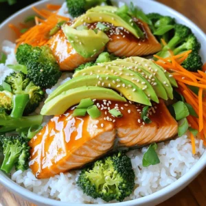 To make the best teriyaki salmon bowls, you need fresh and tasty ingredients. Here’s a list: - Salmon fillets - Soy sauce - Honey - Rice vinegar - Fresh ginger - Garlic - Sesame oil - Cooked jasmine or brown rice - Steamed broccoli florets - Shredded carrots - Avocado - Garnishes (sesame seeds, green onions) These ingredients come together to create a dish that is both flavorful and healthy. The salmon gives you protein and healthy fats. The veggies add crunch and nutrients. The rice acts as a great base. Using fresh ginger and garlic in the sauce makes a big difference. They bring warmth and depth to the flavors. Honey balances the saltiness of the soy sauce. This makes the teriyaki sauce sweet and savory. You can find the full recipe [here](#) to see how these ingredients work together. To start, gather your ingredients for the teriyaki sauce. You will need soy sauce, honey, rice vinegar, grated fresh ginger, and minced garlic. In a small bowl, whisk these together until smooth. This tasty blend gives your salmon a sweet and savory flavor. Using fresh ginger and garlic makes a big difference in taste. Trust me, your taste buds will thank you! Next, heat sesame oil in a non-stick skillet over medium heat. Place your salmon fillets skin-side down in the skillet. Cook for about 4 to 5 minutes. This helps the skin get nice and crispy. After that, gently flip the fillets. Pour half of the teriyaki sauce over the salmon. Cook for another 3 to 4 minutes. Spoon some sauce over the salmon to keep it moist. When done, the salmon should flake easily with a fork. Now it’s time to put everything together! Start by adding a serving of rice to each bowl. I recommend using jasmine or brown rice for a nice touch. Next, add steamed broccoli, shredded carrots, and slices of avocado on top. Place the cooked salmon over the veggies and rice. Drizzle the remaining teriyaki sauce on everything. Finish by garnishing each bowl with sesame seeds and chopped green onions. This will make your dish look and taste amazing! For the full recipe, check out the section above. To cook salmon well, start with fresh fillets. Fresh salmon tastes better and is healthier. Always check for bright, shiny skin. When you cook, heat your pan before adding oil. Use medium heat for even cooking. Cook the salmon skin-side down for a nice crisp. Flip it gently to avoid breaking the fillets. Cook until it flakes easily with a fork. This usually takes about 8 to 10 minutes in total. To make your teriyaki salmon shine, think about layers of flavor. The teriyaki sauce is key; it’s sweet and salty. Add ginger and garlic for warmth and depth. You can also sprinkle a little chili flakes for heat. If you enjoy citrus, a squeeze of lime or lemon brightens the dish. Try using fresh herbs like cilantro or basil for a fresh twist. A beautiful plate makes the meal more enjoyable. Start with a base of rice in each bowl. Layer on the colorful veggies like broccoli and carrots. Place the salmon on top, then drizzle with extra teriyaki sauce. Garnish with sesame seeds and green onions for a nice touch. Use a small side of avocado for creaminess. This not only adds flavor but also makes your bowl look vibrant and inviting. For the full recipe, check the complete instructions above. {{image_2}} You can easily change some ingredients in your teriyaki salmon bowls. If you want a gluten-free option, try tamari instead of soy sauce. If honey is not your thing, maple syrup works well as a sweetener. You can also use coconut aminos for a lighter soy sauce alternative. For a tangy twist, swap rice vinegar for apple cider vinegar. Salmon is tasty, but you can use other proteins too. Chicken breast or thighs make great substitutes. They absorb flavors like salmon. Tofu is perfect for a vegetarian choice. Just press it to remove extra water, then marinate it in the teriyaki sauce. Shrimp is another fun option; it cooks quickly and adds a nice texture. The veggies in your bowl can change based on what you like. Instead of broccoli, use snap peas or bell peppers for crunch. Zucchini or squash will add a nice flavor and texture. You can even toss in some edamame for protein. Just remember to pick colorful veggies to make your bowl vibrant and tasty! For the full recipe, check out the [Full Recipe]. To store your leftover teriyaki salmon bowls, let them cool first. Place the bowls in airtight containers. Make sure to separate the salmon from the rice and veggies. This helps keep everything fresh. You can store them in the fridge for up to three days. When you're ready to eat, reheat the bowls gently. You can use a microwave or stovetop. If using a microwave, cover the bowl with a damp paper towel. Heat for 1-2 minutes, checking often to avoid overcooking. On the stovetop, warm them in a skillet over low heat. Add a splash of water if needed to steam the veggies. You can freeze the salmon and veggies for longer storage. Place them in freezer-safe bags or containers. Remove as much air as possible to prevent freezer burn. The teriyaki sauce can also be frozen. Just be aware that the texture of the veggies might change when thawed. For best quality, eat within one month. You can serve many sides with teriyaki salmon bowls. Some great options include: - Steamed edamame - Cucumber salad - Pickled vegetables - Seaweed salad - Miso soup These sides add fresh flavors and textures. They also balance the meal. Cooked salmon can last up to three days in the fridge. Make sure to store it in an airtight container. This keeps it fresh and safe to eat. If you want to keep it longer, freeze it. Frozen cooked salmon can last for about two to three months. Yes, you can make teriyaki sauce ahead of time. Store it in the fridge for up to a week. Just keep it in a sealed container. If you want to store it longer, you can freeze it. Thaw it before using it in your dishes. Absolutely! You can use any firm fish like tuna or halibut. These fish work well with teriyaki sauce. They also cook similarly to salmon. Just adjust the cooking time based on the thickness of the fillets. You can add many healthy toppings to your teriyaki salmon bowls. Consider these options: - Sliced radishes - Chopped cilantro - Sliced jalapeños - Sprouts These toppings boost flavor and nutrition. They also add a colorful touch to your meal. Yes, you can make a vegetarian version. Use tofu instead of salmon for protein. Tofu absorbs the teriyaki flavor well. You can also use grilled tempeh or seitan as alternatives. Just ensure to adjust cooking times for each option. Salmon is cooked when it flakes easily with a fork. The inside should be opaque and no longer translucent. You can also use a food thermometer. The internal temperature should reach 145°F. Yes! Meal prepping teriyaki salmon bowls is easy and convenient. Cook the salmon and veggies, then store them separately. Assemble the bowls when ready to eat. This keeps everything fresh and tasty. Jasmine and brown rice are both great options. Jasmine rice is fluffy and fragrant. Brown rice is nutty and whole grain. Both pair well with the teriyaki sauce and salmon. Choose based on your taste and health goals. Yes! You can add any veggies you like. Try bell peppers, snap peas, or zucchini. You can even add leafy greens like spinach or kale. More vegetables boost nutrition and flavor. They also make your bowl more colorful and fun. This article covered how to make delicious teriyaki salmon bowls. We looked at the ingredients, instructions, tips, and variations. You can easily customize these bowls to suit your taste. Remember to store leftovers properly for future meals. Cooking can be fun and creative. Enjoy your tasty creation and share it with friends and family. Simple dishes like this can bring joy to your table. Keep experimenting with flavors and ingredients. Happy cooking!