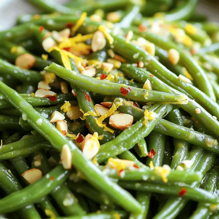 To make garlic butter green beans, you need a few simple ingredients. Here’s what you will need: - 1 lb fresh green beans, trimmed - 4 tablespoons unsalted butter - 4 cloves garlic, minced - 1 teaspoon lemon zest - 1 tablespoon fresh lemon juice - 1/2 teaspoon red pepper flakes (optional) - Salt and pepper to taste - 1/4 cup toasted almond slivers (for garnish) These ingredients come together to make a tasty side dish. Fresh green beans are crisp and bright. The unsalted butter gives a rich flavor. Garlic adds a nice kick, while lemon zest and juice brighten the dish. Red pepper flakes add a touch of heat if you like spice. Finally, almond slivers add a nice crunch. You can find the full recipe in the section above. Blanching the green beans Start by bringing a large pot of salted water to a boil. This step is key to keeping the green beans bright and crisp. Once the water boils, carefully add the trimmed green beans. Blanch them for about 3 to 4 minutes. You want them tender but still firm. Ice bath method After blanching, drain the beans quickly. Transfer them to a bowl filled with ice water. This ice bath stops the cooking process and helps keep their vibrant color. Let the beans cool for a few minutes, then drain them again. Set the beans aside for later. Melting the butter Next, grab a large skillet. Place it over medium heat and add the unsalted butter. Watch it closely as it melts. It should foam and become slightly bubbly. This is when you know it’s ready for the garlic. Sautéing garlic Add the minced garlic to the hot butter. Stir it gently and cook for about 2 minutes. You want the garlic to be fragrant and lightly golden. Be careful not to burn it, as burnt garlic can taste bitter. Tossing in green beans Now, it’s time to add those blanched green beans to the skillet. Toss them in the garlic butter, ensuring they get coated evenly. Cook for another 3 to 4 minutes, stirring often. This step allows the beans to absorb all that rich flavor. Adding lemon zest and juice Finally, add the lemon zest and fresh lemon juice. If you like a little heat, sprinkle in some red pepper flakes. Toss everything well to combine. Season with salt and pepper to taste. For the final touch, garnish with toasted almond slivers before serving. For a complete guide, check the Full Recipe. To get the best green beans, timing is key. Blanching them for 3-4 minutes gives a tender-crisp feel. The beans should be bright green. If you overcook them, they will turn mushy. To keep the crunch, plunge them into ice water right after blanching. This stops the cooking process and locks in that vibrant color. Want to add a twist? Try spices like smoked paprika or cumin. These can give your beans a unique kick. You can also explore garlic variations. Instead of fresh, use roasted garlic for a sweeter taste. For a bolder flavor, try adding garlic powder or garlic oil. Garnishing can turn your dish into a feast for the eyes. Sprinkle toasted almond slivers on top for a nutty touch. You can also add a few lemon wedges for color. For serving sizes, aim for 1/4 of the dish per person. Pair these beans with grilled chicken or fish for a complete meal. For the full recipe, check the earlier section! {{image_2}} You can change the green beans for other veggies. Try using asparagus or broccoli. Both add a nice crunch. You can also use snap peas for a sweet twist. Each veggie gives its own taste and texture. If you want to add a nutty flavor, swap almonds for walnuts or pecans. These nuts bring a different taste. You can even use sunflower seeds for a nut-free option. They add great crunch and flavor too. To change the flavor, think about adding cheese or herbs. A sprinkle of parmesan cheese adds richness. Fresh herbs like thyme or basil can brighten the dish. Just chop them and mix in at the end. If you want more heat, add more red pepper flakes. You can also try cayenne pepper for a kick. Adjust to your taste, and make it as spicy as you like. Making this dish vegan is easy. Just replace butter with olive oil or vegan butter. It keeps the rich flavor without dairy. For a dairy-free option, skip the cheese and use plant-based toppings. If you are following a low-carb plan, skip the nuts. You can add more green beans or other low-carb veggies. This keeps the dish light and healthy without losing flavor. For the full recipe, check out the steps to make these garlic butter green beans. To store leftover garlic butter green beans, place them in an airtight container. Make sure to cool them down first. This helps keep them fresh. Store them in the fridge for up to three days. Always check for any off smells before you eat them. This is key for food safety. If you see any signs of mold, throw them away. Freezing garlic butter green beans is a great way to save them for later. First, let them cool completely. Then, place them in a freezer-safe bag or container. Remove as much air as possible. This prevents freezer burn. You can freeze them for up to three months. To reheat, thaw them in the fridge overnight. Then, heat them in a skillet over low heat until warm. Garlic butter green beans last about three days in the fridge. If you freeze them, they can last up to three months. Always label your containers with the date. This helps you keep track of freshness. Enjoy your delicious green beans while they are still at their best! To make garlic butter green beans, follow these simple steps: 1. Boil a large pot of salted water. 2. Add 1 lb of trimmed green beans and blanch for 3-4 minutes. 3. Drain the beans and place them in ice water to cool. 4. In a skillet, melt 4 tablespoons of unsalted butter over medium heat. 5. Add 4 minced garlic cloves and sauté for 2 minutes. 6. Toss in the green beans and cook for another 3-4 minutes. 7. Stir in 1 teaspoon of lemon zest and 1 tablespoon of lemon juice. 8. Season with salt and pepper to taste, and top with toasted almond slivers. This recipe is quick, easy, and full of flavor. You can find the full recipe above. Yes, you can use frozen green beans! However, fresh green beans have a better texture and flavor. Frozen beans may become mushy if overcooked. If using frozen beans, skip the blanching step. Just sauté them directly in the garlic butter. This saves time but may change the taste slightly. Fresh beans are crispier and have a brighter flavor. Garlic butter green beans pair well with many dishes. Here are some ideas: - Grilled chicken or fish - Roast beef or pork - Quinoa or rice dishes - Mashed potatoes or sweet potatoes These sides enhance the meal and add nutrition. Feel free to mix and match as you like! Garlic butter can be part of a healthy diet. Butter adds flavor but also calories. A tablespoon has about 100 calories. Garlic offers health benefits, like boosting your immune system. Lemon adds vitamin C, which is great for you. Use butter in moderation for a balanced diet. You can also substitute with olive oil for a healthier option. In this post, we explored how to make delicious garlic butter green beans. We covered the ingredients, preparation, and cooking steps. I shared tips for perfect texture and flavor, along with variations for special diets. Remember, you can make this dish your own by changing ingredients or spices. Follow the storage tips to keep leftovers fresh. Garlic butter green beans are easy, flavorful, and a great addition to any meal. Enjoy creating your own version!