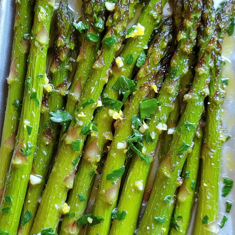 - 1 lb asparagus, trimmed - 3 tablespoons olive oil - 4 cloves garlic, minced - 1 teaspoon lemon zest - 2 tablespoons lemon juice - Sea salt and black pepper - 1/4 teaspoon red pepper flakes (optional) - Fresh parsley for garnish Lemon Garlic Roasted Asparagus is a simple and fresh dish. The main stars are the asparagus, olive oil, and garlic. These ingredients come together to create a bright flavor. Each ingredient plays a key role. The asparagus should be fresh and crisp. When you trim it, cut off the tough ends. This makes the dish more enjoyable. The olive oil adds richness, while the garlic gives a strong taste. I love using minced garlic for its bold flavor. Lemon adds that zesty kick. The zest and juice work together to brighten the dish. Sea salt and black pepper enhance all the flavors. You can adjust these to suit your taste. If you like a bit of heat, add red pepper flakes. They are optional but delicious. Fresh parsley is perfect for a colorful finish. It adds a nice touch to the plate. For the full recipe, check the details above. This dish is easy to make and a great addition to any meal. Enjoy the simple goodness! - Preheat the oven to 425°F (220°C). - Rinse the asparagus under cold water. - Trim the tough ends of the asparagus, about 1-2 inches. - Gather your other ingredients: olive oil, garlic, lemon zest, lemon juice, and spices. - In a large mixing bowl, combine 3 tablespoons of olive oil and 4 minced garlic cloves. - Add 1 teaspoon of lemon zest and 2 tablespoons of lemon juice. - Season the mixture with 1 teaspoon of sea salt, 1/2 teaspoon of black pepper, and 1/4 teaspoon of red pepper flakes, if you like some heat. - Stir everything well until it forms a smooth sauce. - Toss the trimmed asparagus in the lemon garlic sauce. - Make sure each piece is evenly coated. - Line a baking sheet with parchment paper. - Spread the asparagus in a single layer on the sheet. - Roast in the preheated oven for 12-15 minutes. - The asparagus should be tender and a bit crispy at the tips. This simple dish is bright, fresh, and full of flavor. If you want to see the complete recipe with measurements, check out the [Full Recipe]. How to choose fresh asparagus When picking asparagus, look for bright green spears. The tips should be tight and firm. Avoid any that look wilted or have a strong odor. Fresh asparagus should snap when you bend it. This ensures you get the best flavor and texture. Tips for roasting for the perfect texture Roasting asparagus at 425°F gives it a nice crispness. Spread the spears in a single layer on the baking sheet. This allows them to cook evenly. Overcrowding can cause steaming, making them soggy. Roast for 12-15 minutes, until they're tender at the base and slightly crispy at the tips. Adding cheese or nuts for extra richness For a creamy touch, sprinkle some grated Parmesan cheese on top before roasting. If you prefer crunch, toss in some chopped nuts like almonds or walnuts. These additions add great texture and depth to your dish. Using fresh vs. dried herbs Fresh herbs like parsley or thyme brighten the flavors of the asparagus. Dried herbs work well, too. If using dried herbs, use less since they are more potent. Fresh herbs give a nice pop and aroma that dried can’t match. Pairing with main dishes Lemon garlic roasted asparagus pairs well with many main dishes. Try it with grilled chicken, fish, or even a hearty steak. It adds a fresh element to any meal, balancing rich flavors. Creating a balanced meal Consider adding a grain like quinoa or rice to your plate. This adds fiber and makes the meal more filling. A simple salad on the side can also round out your meal nicely. For the full recipe, check the main article section. {{image_2}} You can change the flavor of this dish easily. Try swapping lemon for lime or orange. This small change brings a new taste that brightens the dish. You can also play with different herbs. Basil, thyme, or oregano works well with asparagus. Each herb adds its own touch, making it fun to try new options. Grilling asparagus offers a smoky flavor. Just heat your grill and cook the asparagus for a few minutes. This method gives you a nice char and a different taste. You can also steam the asparagus if you want a softer texture. Steaming keeps the bright green color and makes it tender. Making this dish vegan is simple. Just ensure your olive oil is pure, and skip any added cheese. You can also make it gluten-free, as all the ingredients are naturally gluten-free. For those watching sodium, use low-sodium salt or simply skip it. This way, you can enjoy the dish without worry. For the Full Recipe, check out the ingredients and steps to create this tasty dish. After you enjoy your Lemon Garlic Roasted Asparagus, store any leftovers in the refrigerator. Place them in an airtight container. This keeps them fresh and tasty for up to three days. If you want to keep the dish bright, cover the top with plastic wrap before sealing the lid. To reheat your asparagus, use the oven or a skillet. The oven helps keep it crisp. Preheat it to 350°F (175°C). Place the asparagus on a baking sheet and warm for about 10 minutes. If using a skillet, add a little olive oil, then heat over medium heat. Stir gently for a few minutes. This method helps maintain the flavor. Can you freeze roasted asparagus? Yes, you can freeze it! To do this, let the asparagus cool completely. Then, place it in a single layer on a baking sheet. Freeze for about an hour. Once frozen, transfer the asparagus to a freezer-safe bag. Remove as much air as possible. When you're ready to eat, just thaw it in the fridge overnight. You can also reheat it from frozen. Just add a few extra minutes to your cooking time. Enjoy your Lemon Garlic Roasted Asparagus later with all its great taste! For the full recipe, check out the details in the earlier sections. To make Lemon Garlic Roasted Asparagus perfectly, follow these steps: 1. Preheat your oven to 425°F (220°C). 2. Trim the asparagus ends to remove any tough parts. 3. Mix olive oil, minced garlic, lemon zest, lemon juice, sea salt, black pepper, and red pepper flakes in a bowl. 4. Coat the asparagus well with this mixture. 5. Spread the asparagus on a baking sheet in a single layer. 6. Roast for 12-15 minutes until tender and slightly crispy. This method ensures even cooking and great flavor. Trimming asparagus is simple. Hold the asparagus spear in both hands. Bend it gently until it snaps. This natural break point removes the tough part. You can also line up the spears and cut off about 1-2 inches from the bottom. Yes, you can use frozen asparagus. However, frozen asparagus has more water. This may change the texture after cooking. To use it, thaw and drain the asparagus first. Then, follow the same recipe. You may need to adjust cooking time. Lemon Garlic Roasted Asparagus pairs well with many dishes. Here are some ideas: - Grilled chicken or fish - Quinoa or rice - Pasta with a light sauce - A fresh salad These options balance the flavors and add variety to your meal. To adjust the spice level, you can: - Add more or less red pepper flakes. - Omit the red pepper flakes for no spice. - Use a pinch of cayenne pepper for more heat. These changes let you customize the dish to your taste. For the full recipe, check the earlier section. Lemon garlic roasted asparagus is simple and tasty. You learned about key ingredients and steps. Prepping asparagus, mixing the sauce, and roasting it brings out great flavors. Tips can help you enhance taste and texture. You can also try different herbs or cooking methods based on your needs. Remember to store and reheat leftovers properly to enjoy later. With these ideas, you can make a delicious dish every time. Enjoy your cooking adventure with lemon garlic roasted asparagus!