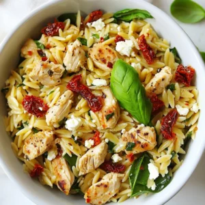 - 1 lb chicken breast, diced - 1 cup orzo pasta - 1/2 cup sun-dried tomatoes, chopped - 2 garlic cloves, minced - 1/2 onion, finely chopped - 3 cups chicken broth - 1 cup spinach, roughly chopped - 1/2 cup feta cheese, crumbled - 2 tablespoons olive oil - 1 teaspoon Italian seasoning - Salt and pepper to taste - Fresh basil leaves for garnish To make my sun-dried tomato chicken orzo, I start with fresh chicken breast. I dice it into bite-sized pieces. This allows for even cooking and great flavor. Next, I choose orzo pasta, which is small and cooks quickly. It absorbs the flavors well. Sun-dried tomatoes add a rich, tangy taste. I chop them into smaller bits for easy mixing. Garlic and onion bring a nice base flavor to the dish. I always use fresh garlic and onion for the best results. Chicken broth is key for a savory taste. I prefer low-sodium broth so I can control the salt level. Spinach adds color and health benefits. It wilts beautifully into the dish, adding both texture and nutrition. For creaminess, I crumble feta cheese on top. It gives a nice salty bite. Olive oil helps to sauté the chicken and veggies. Italian seasoning gives a lovely herb blend, while salt and pepper enhance the taste. Lastly, I garnish with fresh basil leaves. They give a fragrant finish and look pretty on the plate. Having these ingredients ready makes the cooking process easy and enjoyable. {{ingredient_image_1}} To start, heat the olive oil in a large skillet over medium heat. Add the diced chicken breast. Season it with salt, pepper, and Italian seasoning. Sauté the chicken until it turns golden brown. This should take about 7-8 minutes. Once done, remove the chicken from the skillet and set it aside. This step keeps the chicken juicy and flavorful. Next, use the same skillet for added flavor. Add the finely chopped onion and minced garlic. Sauté them until the onion becomes translucent. This usually takes about 3-4 minutes. Then, stir in the chopped sun-dried tomatoes. Cook everything for another 2 minutes. This mix brings out rich, savory notes. Now, it’s time to cook the orzo. Add the orzo pasta to the skillet. Stir it for about 1 minute to lightly toast it. This step enhances the pasta's flavor. Pour in the chicken broth. Bring the mixture to a boil. Reduce the heat and let it simmer for about 10 minutes. The orzo will become tender and soak up the broth. Once the orzo is done, return the cooked chicken to the skillet. Stir in the chopped spinach. Let it wilt for about 2 minutes. This adds vibrant color and nutrients. Remove the skillet from the heat and mix in the feta cheese. Let it melt slightly and blend into the dish. Adjust the seasoning with salt and pepper if needed. Your savory sun-dried tomato chicken orzo is ready to serve! - To keep the chicken juicy, use medium heat and avoid overcooking. I cook it until golden brown. This takes about 7-8 minutes. Make sure the chicken is cooked through but still moist. - For perfectly cooked orzo, stir it into the broth before simmering. This helps it absorb all the flavors. Cook it until tender, about 10 minutes. It should not be mushy. - You can play with herbs and spices. Try adding fresh thyme or parsley. These spices add depth and freshness to your dish. - Feel free to toss in extra vegetables. Bell peppers, zucchini, or mushrooms work well. This adds color and nutrition. Plus, it makes the dish more fun and varied. - Serve your Sun-Dried Tomato Chicken Orzo with a side salad. A light green salad or roasted veggies pairs nicely. - For presentation, use a large bowl or plate. Garnish with fresh basil leaves. This brightens the dish and adds a nice touch. A sprinkle of extra feta on top looks great, too! Pro Tips Choose High-Quality Sun-Dried Tomatoes: Opt for sun-dried tomatoes packed in oil for enhanced flavor and moisture, which can elevate the dish significantly. Don’t Overcook the Orzo: Keep an eye on the orzo while it simmers; you want it al dente for the best texture and to prevent it from becoming mushy. Variate with Proteins: Feel free to substitute the chicken with shrimp or tofu for a different protein option that complements the flavors well. Add Fresh Herbs: Incorporating fresh herbs like parsley or dill at the end can brighten up the dish and add an aromatic touch. {{image_2}} - Make it gluten-free: Use gluten-free orzo instead of regular pasta. This swap keeps the dish tasty and safe for those with gluten issues. Look for brands that offer a good texture and flavor. - Vegetarian alternative: Replace the chicken with chickpeas or tofu. Both options add protein while keeping the dish vibrant and filling. You can also add more veggies like bell peppers or zucchini for a fresh twist. - Different cheese options: While feta is great, try goat cheese or mozzarella. Each cheese brings a unique flavor. Goat cheese adds creaminess, while mozzarella melts beautifully. - Switching up the vegetables: Feel free to add any veggies you love! Try bell peppers, zucchini, or even artichokes. Each choice adds color and flavor, making the dish fun and exciting. - Alternative protein sources: If you want variety, use shrimp or turkey. Both work well in this dish and add new tastes. Shrimp cooks quickly and gives a nice seafood twist, while turkey adds a lean option. - Other types of pasta: Swap orzo for other small pasta, like ditalini or couscous. These changes can alter the texture and give a new feel to the dish. Just keep an eye on cooking times for best results. To keep your Sun-Dried Tomato Chicken Orzo fresh, place it in the fridge. Use an airtight container to prevent moisture loss. This dish stays good for about three to four days. When storing, let it cool to room temperature before sealing. This step helps avoid condensation inside the container. For long-term storage, freeze your orzo dish. First, let it cool completely, then transfer it to a freezer-safe bag or container. Remove as much air as possible to avoid freezer burn. It can last up to three months in the freezer. When you’re ready to eat, thaw it in the fridge overnight. Reheat it on the stovetop or microwave. Add a splash of chicken broth or water to keep it moist. Stir well to ensure even heating. Enjoy your flavorful meal anytime! You can prepare this dish in advance. Start by cooking the chicken and orzo as directed. Allow them to cool. Store the chicken and orzo in separate containers. When you're ready to eat, mix them together in a pan. Add some chicken broth to reheat. This keeps the dish moist and tasty. You can use fresh tomatoes, but the flavor will change. Sun-dried tomatoes have a rich, sweet taste. Fresh tomatoes are juicier and milder. If you choose fresh ones, add more herbs for flavor. You may also need to cook them longer to reduce the moisture. If you need a substitute for feta cheese, try goat cheese or ricotta. They both have a creamy texture. You can also use mozzarella for a milder flavor. If you're dairy-free, try a plant-based cheese. These options still give a nice taste to your dish. Yes, Sun-Dried Tomato Chicken Orzo can be healthy. It has lean protein from chicken. The spinach adds vitamins, and the orzo gives you energy. Just watch the cheese and oil amounts if you're counting calories. This meal is balanced and nutritious when enjoyed in moderation. Sun-Dried Tomato Chicken Orzo lasts about 3 to 4 days in the fridge. Store it in an airtight container to keep it fresh. If you want to keep it longer, consider freezing it. Just remember to thaw it in the fridge before reheating. This recipe for Sun-Dried Tomato Chicken Orzo is a delicious blend of flavors. You learn how to sauté chicken, prepare the base with garlic and sun-dried tomatoes, and achieve perfectly cooked orzo. Tips for juicy chicken and flavor enhancements make this dish special. Whether you want to adjust for diet or store leftovers, this meal fits your needs. Enjoy experimenting and make it your own. Cooking can be fun, and this dish lets your creativity shine. Dive in and savor each bite!