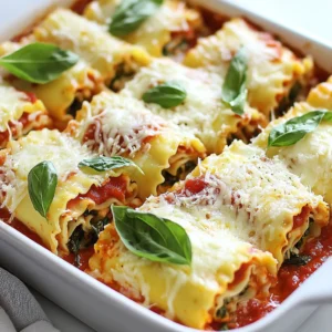 - 9-12 lasagna noodles - 2 cups ricotta cheese - 2 cups shredded mozzarella cheese (divided) - 1 cup grated Parmesan cheese - 1 large egg - 2 cups spinach (fresh or frozen, thawed and drained) - 2 cups marinara sauce - 1 teaspoon garlic powder - 1 teaspoon Italian seasoning - Salt and pepper to taste - Fresh basil leaves for garnish (optional) When choosing ingredients, quality matters. Look for fresh ricotta cheese. It adds a creamy texture. Opt for whole milk mozzarella for the best melt. If you prefer a stronger flavor, use aged Parmesan. Fresh spinach is great, but frozen works too. Just make sure to drain it well. You can swap ricotta for cottage cheese if you want a lighter option. For a dairy-free version, try cashew cheese. Instead of marinara, use pesto for a twist. If you don’t have lasagna noodles, try using zucchini slices or eggplant for a low-carb option. {{ingredient_image_1}} To start, cook the lasagna noodles. Boil them until they are just right, or al dente. This means they should be firm but not hard. Drain the noodles and lay them flat on a clean kitchen towel. This helps them cool and avoids sticking. Make sure they are not overlapping. Now, let’s make the filling. In a mixing bowl, combine the ricotta cheese, one cup of mozzarella cheese, and Parmesan cheese. Add the egg, spinach, garlic powder, Italian seasoning, salt, and pepper. Mix everything well until it looks smooth and creamy. This filling is the heart of our roll ups. Next, it’s time to roll up the noodles. Spread a thin layer of marinara sauce on the bottom of a baking dish. Take one noodle and spread a good amount of the cheese and spinach filling along it. Roll the noodle tightly from one end to the other. Place the roll seam side down in the dish. Repeat this for all noodles. Arrange them side by side in the dish. Pour the rest of the marinara sauce on top, covering the roll ups. Finally, sprinkle the remaining mozzarella cheese over everything. For baking, cover the dish with aluminum foil. Make sure the foil does not touch the cheese. Bake at 375°F (190°C) for 25 minutes. Then, remove the foil and bake for another 15 minutes. This makes the cheese bubbly and golden. Let the roll ups cool for about 5-10 minutes before serving. If you want, add fresh basil leaves for a nice touch. Enjoy your savory lasagna roll ups! When making lasagna roll ups, some mistakes can spoil your dish. First, avoid overcooking the noodles. They should be al dente, so they hold their shape. If you cook them too soft, they may tear when you roll them. Another mistake is not cooling the noodles properly. If they are too hot, the filling will melt and ooze out. Lastly, be careful not to skimp on the sauce. It keeps the roll ups moist and flavorful. For creamy and delicious cheese filling, use fresh ingredients. Ricotta cheese should be smooth, not grainy. Mixing in an egg helps bind everything together. Use a good quality mozzarella cheese for that melty goodness. Remember to save some mozzarella for the top! This will create a golden layer that is both tasty and inviting. To boost flavor, add fresh herbs like basil or parsley to your cheese mix. This gives a fresh taste that brightens the dish. For added nutrition, mix in vegetables like bell peppers or zucchini. These veggies complement the spinach and add color. You can also swap regular noodles for whole wheat or gluten-free options. This makes your roll ups healthier while still being delicious. Pro Tips Perfectly Cooked Noodles: Make sure to cook the lasagna noodles until they are al dente to prevent them from becoming mushy during baking. Spinach Options: If using frozen spinach, ensure it is thoroughly thawed and drained to avoid excess moisture in the filling. Cheese Variations: Feel free to mix in other cheeses like ricotta or provolone for added flavor and creaminess. Make Ahead: You can prepare the roll ups a day in advance, cover them, and store them in the refrigerator until you're ready to bake. {{image_2}} You can make lasagna roll ups without meat. Use more veggies for flavor. Great choices include zucchini, mushrooms, or bell peppers. Add these to your cheese and spinach mix. You can also swap ricotta for a vegan cheese. This way, you keep it tasty and plant-based. For those who love meat, add ground beef or sausage. Cook it first, drain the fat, and mix it into the cheese filling. You can also layer in pepperoni or prosciutto. This gives your roll ups a hearty flavor. Don't forget to mix in some herbs for extra taste. If you need gluten-free roll ups, choose gluten-free lasagna noodles. Many brands offer tasty options. You can also use zucchini slices instead of noodles. This cuts carbs and adds freshness. Just slice the zucchini thin and grill or roast it first. You’ll get a great flavor with fewer carbs. After your meal, let the lasagna roll ups cool down. Place the leftovers in an airtight container. Store them in the fridge for up to 3 days. This keeps the flavors fresh. To reheat, preheat your oven to 350°F (175°C). Place the roll ups in an oven-safe dish. Add a bit of marinara sauce on top to keep them moist. Cover the dish with foil. Heat for about 20 minutes or until warm. This way, the cheese stays gooey and delicious. You can freeze lasagna roll ups for later. Wrap each roll up tightly in plastic wrap. Then, place them in a freezer bag or a container. They can last up to 3 months in the freezer. When you're ready to eat them, thaw in the fridge overnight. Then, follow the reheating tips to enjoy them again. Yes, you can make Lasagna Roll Ups in advance. Prepare the roll ups and place them in a baking dish. Cover them with plastic wrap. You can store them in the fridge for up to two days. This saves time on busy nights. Just remember to add a bit more baking time if they are cold from the fridge. The best way to reheat your Lasagna Roll Ups is in the oven. Preheat the oven to 350°F (175°C). Place the roll ups in a baking dish. Add a splash of marinara sauce to keep them moist. Cover with foil to prevent drying. Heat for about 20-25 minutes. Check that they are hot all the way through before serving. Yes, you can use no-boil lasagna noodles. They work well in this recipe. Just layer them with the cheese filling and sauce. They will cook as they bake in the oven. This saves time and effort, making your lasagna roll ups even easier to prepare. This blog post covered everything you need for perfect lasagna roll ups. We discussed ingredients, instructions, tips, variations, and storage methods. You can avoid common mistakes and enhance flavor easily. Remember, whether you choose veggie or meat versions, the key lies in the right ingredients and techniques. With these tips, you can make delicious meals with confidence. Enjoy your cooking!
