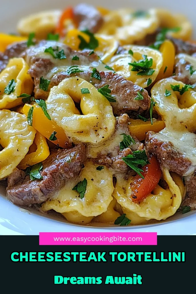 Discover this mouthwatering Cheesesteak Tortellini recipe featuring tender ribeye steak and a creamy provolone cheese sauce. Perfect for busy nights, this dish combines savory flavors and cheesy goodness into a quick dinner recipe. Impress your family with this easy-to-make creamy tortellini dish that’s both satisfying and delicious. Save this recipe today and enjoy a delightful twist on classic ribeye steak recipes! #CheesesteakTortellini #QuickDinnerRecipes #CreamyTortellini #ProvoloneCheeseSauce