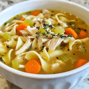 When making classic chicken noodle soup, fresh and quality ingredients shine. Here&rsquo;s what you need: - Chicken: Use 2 boneless, skinless chicken breasts for a tender base. - Vegetables: Gather 2 medium carrots, sliced, 2 celery stalks, diced, and 1 medium onion, chopped. These add great flavor and texture. - Herbs and spices: Grab 1 teaspoon of dried thyme, 1 teaspoon of dried oregano, and 1 bay leaf. These herbs bring warmth to the soup. - Broth and noodles: You will need 8 cups of chicken broth and 2 cups of egg noodles. They create the heart of the dish. - Additional seasonings: Keep salt, pepper, and 2 tablespoons of olive oil on hand. They enhance the taste. - Garnish options: Fresh parsley or dill adds a nice touch once the soup is served. With these ingredients, you can create a soup that comforts and warms. Each item plays a vital role in making this dish special. {{ingredient_image_1}} 1. Saut&eacute;ing vegetables and aromatics Start by heating 2 tablespoons of olive oil in a large pot over medium heat. Add 1 chopped onion, 2 sliced carrots, and 2 diced celery stalks. Cook these for about 5 minutes. You want them to soften but not brown. Next, stir in 3 minced garlic cloves, 1 teaspoon of dried thyme, and 1 teaspoon of dried oregano. Cook for another 2 minutes. The smell will be amazing! 2. Adding chicken and broth Now, it's time to add the star of the show! Place 2 boneless, skinless chicken breasts into the pot. Pour in 8 cups of chicken broth along with 1 bay leaf, salt, and pepper to taste. Bring everything to a boil. 3. Shredding the chicken Once boiling, reduce the heat and let it simmer for 20-25 minutes. This lets the flavors blend. After that, take out the chicken and shred it using two forks. It should be tender and easy to pull apart. Put the shredded chicken back into the pot. 4. Cooking noodles Add 2 cups of egg noodles to the pot. Let the soup simmer for another 10 minutes. This cooks the noodles until they are tender. Make sure to taste the soup and adjust the seasoning if needed. Don&rsquo;t forget to remove the bay leaf before you serve! - Importance of simmering time Simmering is key to making rich soup. It allows the flavors to meld perfectly. If you rush this step, you might lose depth in taste. - How to ensure chicken is cooked properly The chicken should be cooked through and easy to shred. Make sure it reaches an internal temperature of 165&deg;F. Use a meat thermometer for best results! Using homemade chicken broth boosts the soup's taste. It adds depth and richness. You can make broth by simmering chicken bones, veggies, and herbs. It takes time, but the flavor is worth it. You can also use store-bought broth in a pinch. Consider adding more herbs and spices for extra flavor. Fresh thyme or dill can brighten the soup. You might also try a pinch of paprika for warmth. A squeeze of lemon juice adds a nice zing. Experiment to find what you like best. To make the soup kid-friendly, adjust the flavors. Kids often prefer milder tastes. Reduce the garlic and herbs if needed. You can also add some sweet corn for a fun twist. For noodles, consider using fun shapes like stars or hearts. Kids enjoy these playful options. Egg noodles are great, but you can use whole wheat or gluten-free noodles too. Just ensure the noodles are tender, so they are easy to eat. Pro Tips Use Homemade Broth: For an even richer flavor, use homemade chicken broth instead of store-bought. It enhances the overall taste and nutrition of the soup. Adjust Noodle Cooking Time: If you prefer firmer noodles, add them to the pot later in the cooking process. This prevents them from becoming too soft. Herb Variations: Feel free to experiment with fresh herbs like thyme or dill instead of dried. Fresh herbs can provide a more vibrant flavor. Leftover Storage: Store leftover soup in an airtight container in the fridge for up to 3 days. Reheat gently to enjoy later. {{image_2}} You can swap chicken for other meats. Turkey works great if you want a change. If you prefer pork, use tender pork loin. For something different, try shrimp. They cook fast and add a nice flavor. For a vegetarian or vegan option, use chickpeas or lentils. They give protein and texture. You can also use tofu, which absorbs flavors well. Replace chicken broth with vegetable broth for a tasty base. You can choose whole wheat noodles for more fiber. They add a hearty touch to the soup. If you need a gluten-free choice, look for rice noodles or gluten-free pasta. They work fine and keep the soup light. Making your own noodles can be fun. Mix flour and eggs to create fresh egg noodles. Roll and cut them to your liking. Homemade noodles add a special touch to your dish. They soak up the flavors nicely, making each bite delightful. To keep chicken noodle soup fresh, follow these tips. First, let the soup cool down before storing. Pour it into airtight containers. Store it in the fridge if you plan to eat it soon. Chicken noodle soup stays fresh for about 3 to 4 days in the fridge. If you want to keep it longer, freeze the soup. Pour it into freezer-safe containers, leaving some space at the top. This space allows for expansion as it freezes. Chicken noodle soup can last up to 3 months in the freezer. When it&rsquo;s time to eat, reheating soup is easy. You can use a pot or microwave. If you use the stove, heat it over medium heat. Stir it often to ensure even heating. When reheating in the microwave, use a microwave-safe bowl. Heat it for 1 to 2 minutes. Stir halfway to warm it evenly. Be careful with the noodles. They can get mushy if they cook too long. Add the noodles when you first make the soup. If you freeze it, cook the noodles separately when you reheat. Then mix them in to keep them firm. Enjoy your warm soup! You can keep chicken noodle soup in the fridge for about three to four days. Store it in an airtight container. If you want to keep it longer, freeze the soup. When frozen, it can last for about two to three months. Make sure to let it cool before freezing. Yes, rotisserie chicken is great for this soup. It saves time and adds flavor. Just shred the chicken and add it when you would normally add the raw chicken. This will cut down on cooking time. You can add many vegetables to chicken noodle soup. Here are some tasty options: - Peas - Corn - Green beans - Spinach - Mushrooms Feel free to mix and match based on your taste and what you have on hand. Absolutely! Making chicken noodle soup ahead of time is a great idea. The flavors blend together and taste even better the next day. Just remember to cook the noodles separately if you plan to store leftovers. This way, they won&rsquo;t get mushy when you reheat the soup. This post covered all you need for delicious chicken noodle soup. We discussed key ingredients, preparation steps, and helpful cooking tips. You learned some tricks to boost flavor and ways to make it kid-friendly. We explored variations using different proteins and noodles, along with storage advice. In summary, with simple steps and choices, you can create a warm bowl of comfort. Enjoy experimenting with flavors and sharing this classic dish. It's a meal that brings smiles and warmth to any table.