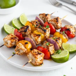 - 1.5 pounds boneless, skinless chicken breasts - 3 tablespoons olive oil - Juice of 2 limes - Zest of 1 lime - 2 teaspoons chili powder - 1 teaspoon cumin - 1 teaspoon garlic powder - 1 teaspoon onion powder - 1 teaspoon smoked paprika - Salt and pepper to taste - 1 red bell pepper, cut into 1-inch pieces - 1 yellow bell pepper, cut into 1-inch pieces - 1 medium red onion, cut into 1-inch pieces - Skewers (wooden or metal) To make these kabobs burst with flavor, I use fresh ingredients. Boneless, skinless chicken breasts work best. They soak up the marinade well. I cut them into 1-inch cubes for even cooking. For the marinade, I blend olive oil, lime juice, and zest. The lime gives a fresh kick. I add spices like chili powder and cumin for warmth. Garlic powder and onion powder add depth. Smoked paprika gives a nice smoky note. I season with salt and pepper to taste. Colorful peppers make the kabobs fun. I use red and yellow bell peppers. They add sweetness and crunch. A red onion brings a nice bite. The skewers hold everything together, making them easy to grill. Using fresh ingredients enhances the taste. You can also switch up the veggies or spices to fit your taste. Enjoy the vibrant flavors of these kabobs that are perfect for any meal! {{ingredient_image_1}} - In a large bowl, combine olive oil, lime juice, lime zest, chili powder, cumin, garlic powder, onion powder, smoked paprika, salt, and pepper. Mix until smooth. - Add the chicken cubes to the marinade. Make sure each piece gets a good coat. Cover the bowl and refrigerate for at least 30 minutes. For more flavor, let it sit for up to 2 hours. - Soak wooden skewers in water for at least 30 minutes. This helps prevent burning while grilling. - Preheat your grill to medium-high heat. - Thread the marinated chicken onto the skewers. Alternate with pieces of red and yellow bell peppers and red onion. - Place the kabobs on the grill once it&rsquo;s hot. Grill for about 10-12 minutes. Turn them every few minutes. The chicken should reach 165&deg;F (75&deg;C) for safe eating. - Once done, remove the kabobs from the grill. Let them rest for a few minutes before serving. To get the best flavor from your kabobs, marinate the chicken for at least 30 minutes. If you have time, try marinating for up to 2 hours. This longer time adds depth to the taste. For spice lovers, add some cayenne pepper or red pepper flakes to kick it up a notch. You can also use a mild chili powder for less heat. For nice grill marks, preheat your grill to medium-high heat. This helps the chicken sear quickly. When you place the kabobs on the grill, don&rsquo;t move them around too much. Let them sit for a few minutes to create those beautiful marks. Aim for a grill temperature of about 375&deg;F to 400&deg;F. This keeps the chicken juicy and flavorful. When serving, garnish the kabobs with lime wedges and fresh cilantro. This adds color and bright flavor to your dish. Serve them on a large platter for a stunning presentation. Pair with cilantro lime rice or a fresh salad for a complete meal. These sides balance the spicy flavors of the kabobs perfectly. Pro Tips Marinate for Maximum Flavor: Allow the chicken to marinate for at least 2 hours, or overnight if possible, to fully absorb the chili lime flavors. Vegetable Variety: Feel free to add other vegetables like zucchini, mushrooms, or cherry tomatoes for added color and taste. Check for Doneness: Use a meat thermometer to ensure chicken reaches an internal temperature of 165&deg;F (75&deg;C) for safe eating. Resting Time: Let the kabobs rest for a few minutes after grilling to allow juices to redistribute, ensuring tender and juicy chicken. {{image_2}} You can switch from chicken to shrimp or beef. Shrimp cooks fast and adds a sweet taste. Just marinate it like chicken. Beef offers a hearty bite. Use cuts like sirloin or tenderloin. For a vegetarian option, try tofu. Firm tofu works best. Press it to remove water, then cube it. Marinate just like the chicken. Grilling gives it a nice texture. You can mix up the flavors with different marinades. Try a citrus marinade with orange juice. This adds a sweet twist. Or use a teriyaki sauce for an Asian flair. BBQ sauce gives a smoky taste. Each option brings a new flavor profile to your kabobs. Add colorful veggies for a fresh look. Zucchini and mushrooms are great choices. They grill well and soak up flavors. Cherry tomatoes add a burst of juice. Mixing in a variety of vegetables makes your kabobs pop on the plate. This not only makes them tasty but also fun to eat! Store your leftover kabobs in an airtight container. Keep them in the fridge. They stay fresh for up to three days. If you want to freeze them, wrap each kabob tightly in plastic wrap. Place them in a freezer bag. You can freeze them for up to three months. When reheating kabobs, use the oven for the best taste. Preheat your oven to 350&deg;F (175&deg;C). Place kabobs on a baking sheet. Heat for about 10 minutes, or until warm. Avoid using the microwave as it can dry out the chicken. If you must use the microwave, cover the kabobs with a damp paper towel. This helps keep them moist. You can prep your kabobs in advance for easy meals. Simply marinate the chicken and cut the veggies ahead of time. Store them separately in the fridge for up to a day. When ready to cook, just assemble the kabobs and grill. For quick meals, freeze the marinade in ice cube trays. You can pop out a cube whenever you want to marinate chicken quickly. I recommend marinating chicken for at least 30 minutes. This time lets the chicken soak up all the great flavors. For even better taste, try marinating for 2 hours. The longer the chicken sits in the marinade, the more intense the flavors become. Grilling is the best way to cook chicken kabobs. It gives them a nice smoky flavor and beautiful grill marks. You can also bake them in the oven if grilling isn&rsquo;t an option. Just set your oven to 400&deg;F (200&deg;C) and cook for about 20-25 minutes. To know if your kabobs are done, check the internal temperature. It should reach 165&deg;F (75&deg;C). If you don&rsquo;t have a thermometer, look for clear juices running from the chicken, and ensure it&rsquo;s not pink inside. The chicken should look white and firm when it's cooked properly. In this article, we explored making tasty chicken kabobs. We discussed the key ingredients, including chicken breasts, spices, and fresh veggies. You learned how to marinate your chicken and prepare your skewers for grilling. We shared tips for perfect grilling and creative serving ideas. Now, you can customize flavors with different proteins and fun veggies. Enjoy your delicious kabobs and impress your friends at the next meal!