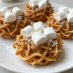 - 2 cups chow mein noodles - 1 cup butterscotch chips - 1/2 cup creamy peanut butter - 1/2 cup unsweetened shredded coconut - 1/2 cup mini marshmallows - 1/2 teaspoon vanilla extract - Pinch of sea salt To make Butterscotch Haystack Cookies, you need some fun and tasty ingredients. First, chow mein noodles give the cookies their unique shape and crunch. Butterscotch chips add sweetness and a rich flavor. Creamy peanut butter brings a smooth texture and adds depth. Unsweetened shredded coconut gives a tropical twist. Mini marshmallows add chewy bites that kids love. Vanilla extract boosts the flavors, and a pinch of sea salt balances the sweetness. You can find these ingredients at any grocery store. I recommend using high-quality butterscotch chips for the best flavor. If you want to try something new, swap creamy peanut butter for crunchy. This change adds texture and extra flavor. Get ready to create a delightful treat that everyone will enjoy! {{ingredient_image_1}} Start by melting the butterscotch chips and peanut butter. Take a medium microwave-safe bowl. Add the butterscotch chips and creamy peanut butter into the bowl. Microwave the mixture in 30-second intervals. Stir between each interval. Keep going until it&rsquo;s smooth and melted, which takes about 1 to 1.5 minutes. Once melted, remove the bowl from the microwave. Now, stir in the vanilla extract and a pinch of sea salt. Mix it well until everything blends together. This mixture creates a rich and sweet base for your cookies. Next, it&rsquo;s time to fold in the other ingredients. Gently add the chow mein noodles, shredded coconut, and mini marshmallows into the butterscotch mixture. Use a spatula to mix everything together. Make sure each piece is well coated with the butterscotch. This step gives your cookies their unique texture and taste. Now, drop the mixture onto a baking sheet. Use a spoon or cookie scoop to form heaping tablespoons. Shape them into little haystack forms. Line the baking sheet with parchment paper for easy cleanup. Once you&rsquo;ve shaped all the cookies, it&rsquo;s time to let them set. Allow the cookies to cool at room temperature for about 30 minutes. If you want to speed things up, place them in the refrigerator for about 10 to 15 minutes. After they cool, you can enjoy your tasty butterscotch haystack cookies! To get the right consistency, melt the butterscotch chips and peanut butter slowly. Use 30-second bursts in the microwave. Stir well in between. This helps avoid lumps. Once melted, add vanilla and salt for flavor. Cooling time is key. Let cookies cool at room temperature for about 30 minutes. If you&rsquo;re in a hurry, the fridge works too. Just ten to fifteen minutes will set them nicely. One big mistake is overheating the mixture. If it gets too hot, the texture changes. It may become too runny or too hard. Always monitor your microwave time. Another mistake is not coating everything evenly. Make sure you fold in the chow mein noodles and other ingredients well. This ensures each bite is tasty. For serving, use a fun platter. You can add extra shredded coconut on top for flair. A drizzle of melted chocolate also adds a nice touch. Consider different shapes! If you want, form them into nests or other fun designs. This makes your cookies look even more inviting and special. Pro Tips Use Fresh Ingredients: Ensure that your coconut and marshmallows are fresh for the best flavor and texture in your cookies. Experiment with Add-ins: Feel free to add chopped nuts or dried fruits to customize your haystack cookies for a unique twist. Proper Melting Technique: When melting butterscotch chips and peanut butter, do it slowly and stir often to prevent burning. Storage Tips: Store cookies in an airtight container at room temperature to keep them fresh for longer. {{image_2}} You can change the nut butter in this recipe. Use almond butter or sunflower seed butter if you want a twist. Each choice adds its own taste and texture. Coconut is a fun ingredient too. If you don't like shredded coconut, try using chopped nuts or seeds. You can also mix in some chocolate chips for a sweet surprise. To spice things up, add a dash of cinnamon or nutmeg. These warm spices give the cookies a cozy flavor. You can also use a few drops of almond or coconut extract for extra depth. Fruits can enhance your cookies as well. Try adding dried cranberries or raisins. Fresh fruit like diced apples or bananas can also work, but be careful with moisture. For gluten-free cookies, use gluten-free chow mein noodles. Check the labels to ensure they are safe for your diet. This small swap keeps the taste while making it gluten-free. If you want vegan cookies, use dairy-free butterscotch chips. Replace the peanut butter with a nut-free option, like sunflower seed butter. This way, everyone can enjoy the cookies! To keep your Butterscotch Haystack Cookies fresh, store them at room temperature. Use an airtight container to shield them from air and moisture. This helps maintain their tasty crunch. You can keep them this way for up to a week. If you want to save them for later, refrigeration works too. Place the cookies in a sealed container and pop them in the fridge. They can last about two weeks this way. For even longer storage, consider freezing. Lay the cookies on a baking sheet until firm. Then transfer them to a freezer bag. They can stay fresh for up to three months in the freezer. Butterscotch Haystack Cookies are best enjoyed fresh but can last. When stored at room temperature, they last about a week. In the fridge, they last around two weeks. If frozen, they can be good for three months. Keep an eye out for signs of spoilage. If the cookies feel soft or have an off smell, it&rsquo;s time to toss them. Always check for any changes in color or texture. Fresh cookies should be crunchy and look vibrant. To make these cookies gluten-free, swap chow mein noodles for gluten-free noodles. You can find them in most grocery stores. Be sure to check the labels to confirm they are gluten-free. Yes, you can use other chips if you want. Try chocolate chips or peanut butter chips for a different flavor. Your cookies will still be tasty and fun. To set the cookies fast, chill them in the fridge. Just 10 to 15 minutes will help them firm up nicely. This helps the cookies hold their shape better. If you are in a hurry, this is the best trick! This blog gave you all you need to make Butterscotch Haystack Cookies. You learned the ingredients, how to prepare the mix, and tips for perfect cookies. Remember, avoid common mistakes like overheating and uneven coating. Explore variations for unique flavors and dietary needs. Proper storage helps keep your cookies fresh longer. With these steps, you can enjoy tasty treats anytime. Now, it&rsquo;s your turn to bake and share these fun cookies with others!